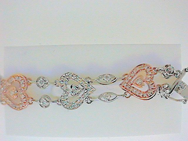 Lady’s 14 Karat Rose & White Gold Diamond Heart Bracelet