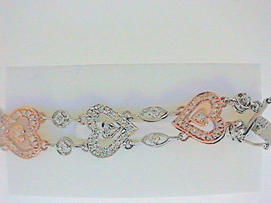 Lady’s 14 Karat Rose & White Gold Diamond Heart Bracelet
