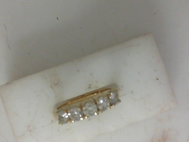 Lady’s 14kt Yellow Gold Diamond Wedding Band