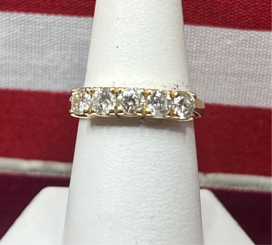 Lady’s 14kt Yellow Gold Diamond Wedding Band